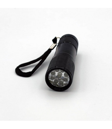 Linterna LED de mano con luz verde de la marca SPIDERLUX