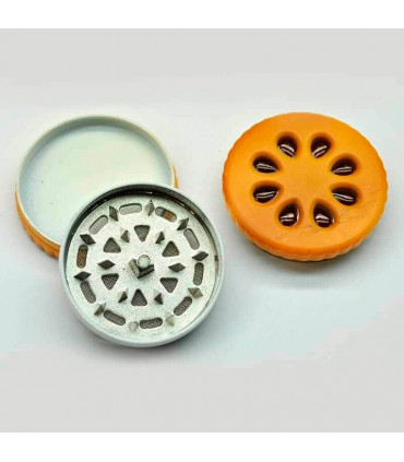 Grinder para marihuana on polinizador. Galleta.
